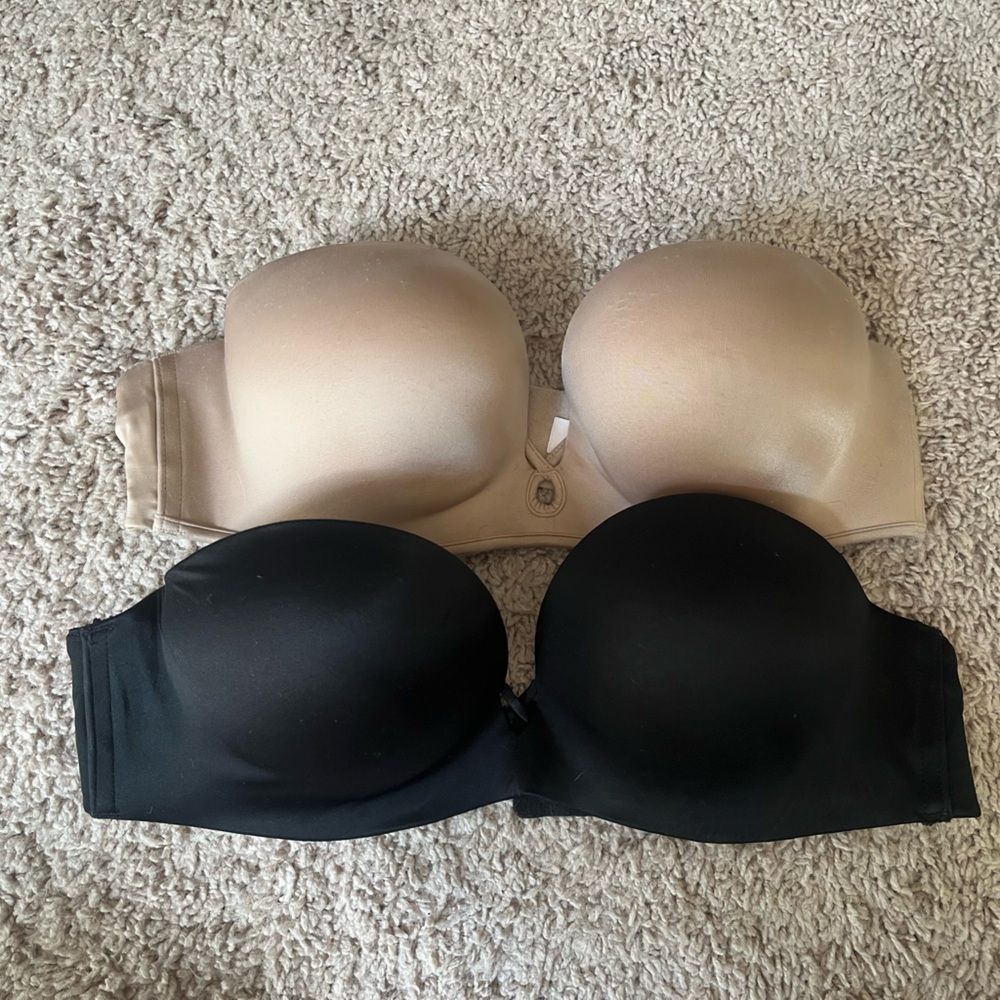 1 nude and 1 black strapless bombshell Victoria’s Secret 34B bras.